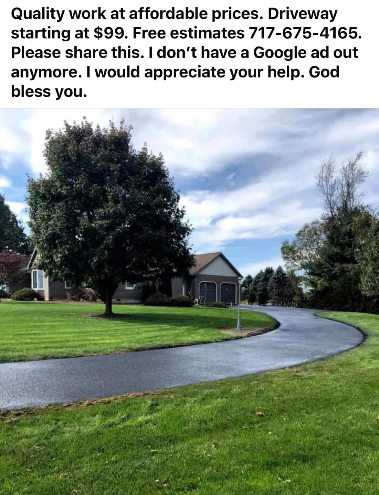 Curved asphalt driveway with smooth dark surface leading to residential home and garage